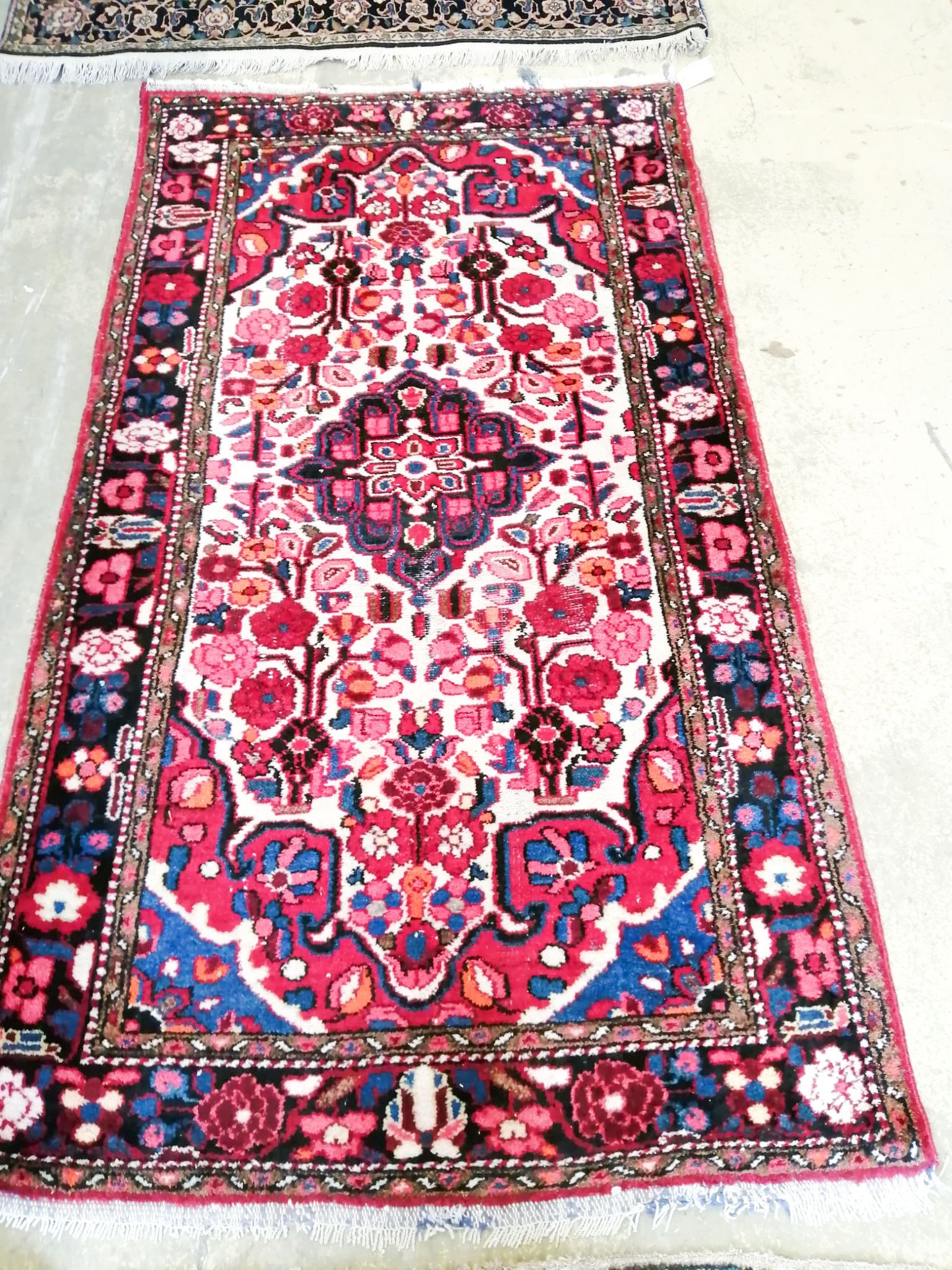 095Two Oriental rugs and another Eastern rug, largest 204 x 140cm